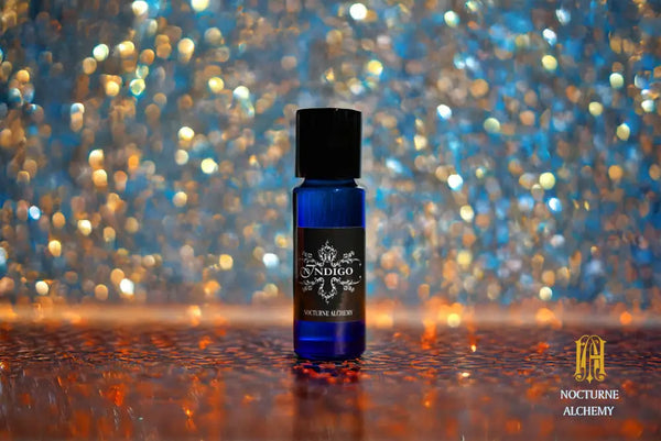 5ml slender blue with insert/dropper and black metal twist lid