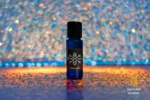 5ml slender blue with insert/dropper and black metal twist lid