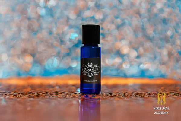 5ml slender blue with insert/dropper and black metal twist lid