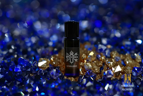 5ml Slender Blue bottle with insert dropper and black screw lid. Patchouli