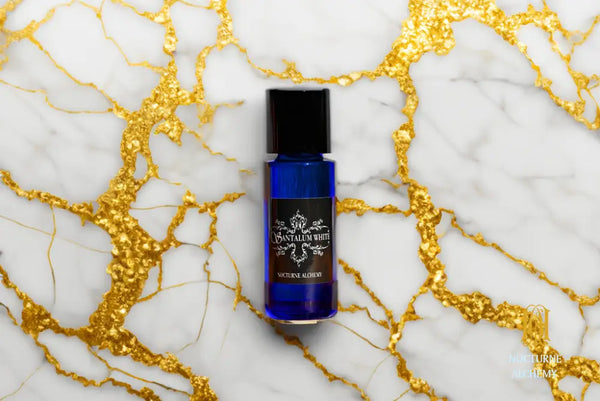 5ml Slender Blue bottle with insert dropper and black screw lid. Santalum White